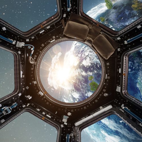 Cockpit view from International Space Station operating nearby of planet Earth. Concept of exploration and research of new life. Some elements are composed by NASA images.